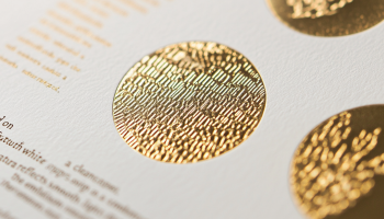 u6822419438_A_close-up_view_of_a_simple_gold_foil-stamped_emb_a3a7f0b8-bc76-4d96-8e23-3b6afdfee772_2 u6822419438_A_close-up_view_of_a_simple_gold_foil-stamped_emb_a3a7f0b8-bc76-4d96-8e23-3b6afdfee772_2